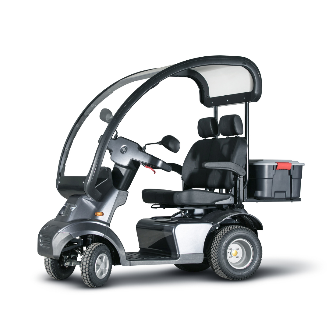 Explore the outdoors with the Afikim Afiscooter S4 HD Bariatric Mobility Scooter. Its durable dual-seat design features a sleek black frame, canopy, handlebars, storage box, and a transparent windshield. This three-wheeler offers exceptional all-terrain performance for your adventures.